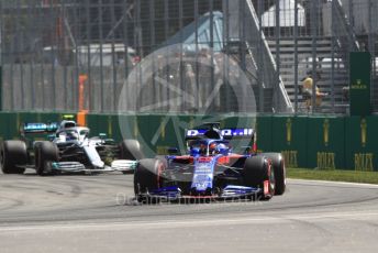 World © Octane Photographic Ltd. Formula 1 – Canadian GP. Practice 2. Scuderia Toro Rosso STR14 – Daniil Kvyat and Mercedes AMG Petronas Motorsport AMG F1 W10 EQ Power+ - Valtteri Bottas. Circuit de Gilles Villeneuve, Montreal, Canada. Friday 7th June 2019.