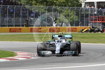 World © Octane Photographic Ltd. Formula 1 – Canadian GP. Qualifying. Mercedes AMG Petronas Motorsport AMG F1 W10 EQ Power+ - Valtteri Bottas and Renault Sport F1 Team RS19 – Daniel Ricciardo. Circuit de Gilles Villeneuve, Montreal, Canada. Saturday 8th June 2019.