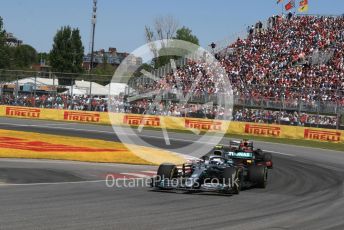 World © Octane Photographic Ltd. Formula 1 – Canadian GP. Race. Mercedes AMG Petronas Motorsport AMG F1 W10 EQ Power+ - Valtteri Bottas and Aston Martin Red Bull Racing RB15 – Max Verstappen. . Circuit de Gilles Villeneuve, Montreal, Canada. Sunday 9th June 2019.