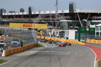 World © Octane Photographic Ltd. Formula 1 – Canadian GP. Race. Scuderia Ferrari SF90 – Sebastian Vettel leads the pack off the grid. Circuit de Gilles Villeneuve, Montreal, Canada. Sunday 9th June 2019.