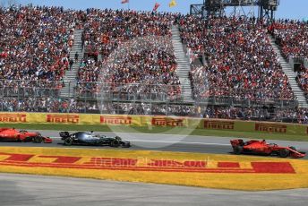 World © Octane Photographic Ltd. Formula 1 – Canadian GP. Race. Scuderia Ferrari SF90 – Sebastian Vettel, Mercedes AMG Petronas Motorsport AMG F1 W10 EQ Power+ - Lewis Hamilton and Charles Leclerc. Circuit de Gilles Villeneuve, Montreal, Canada. Sunday 9th June 2019.