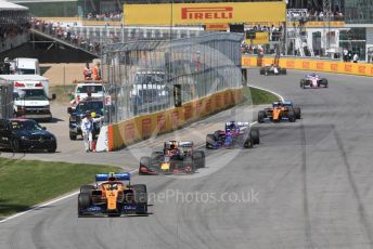 World © Octane Photographic Ltd. Formula 1 – Canadian GP. Race. McLaren MCL34 – Lando Norris, Aston Martin Red Bull Racing RB15 – Max Verstappen, Scuderia Toro Rosso STR14 – Daniil Kvyat and Lando Norris. Circuit de Gilles Villeneuve, Montreal, Canada. Sunday 9th June 2019.