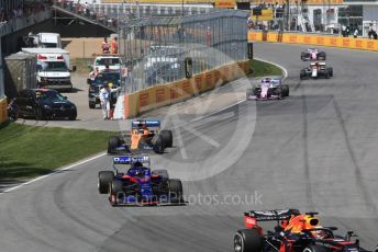 World © Octane Photographic Ltd. Formula 1 – Canadian GP. Race. Scuderia Toro Rosso STR14 – Daniil Kvyat and McLaren MCL34 – Carlos Sainz. Circuit de Gilles Villeneuve, Montreal, Canada. Sunday 9th June 2019.