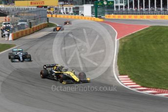 World © Octane Photographic Ltd. Formula 1 – Canadian GP. Race. Renault Sport F1 Team RS19 – Nico Hulkenberg. and Mercedes AMG Petronas Motorsport AMG F1 W10 EQ Power+ - Valtteri Bottas. Circuit de Gilles Villeneuve, Montreal, Canada. Sunday 9th June 2019.