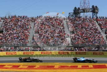 World © Octane Photographic Ltd. Formula 1 – Canadian GP. Race. Rich Energy Haas F1 Team VF19 – Romain Grosjean and ROKiT Williams Racing FW 42 – George Russell. . Circuit de Gilles Villeneuve, Montreal, Canada. Sunday 9th June 2019.