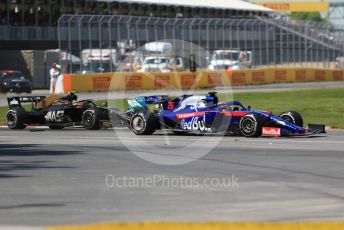 World © Octane Photographic Ltd. Formula 1 – Canadian GP. Race. Scuderia Toro Rosso STR14 – Daniil Kvyat and Rich Energy Haas F1 Team VF19 – Kevin Magnussen. . Circuit de Gilles Villeneuve, Montreal, Canada. Sunday 9th June 2019.