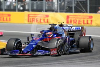 World © Octane Photographic Ltd. Formula 1 – Canadian GP. Race. Scuderia Toro Rosso STR14 – Daniil Kvyat and Rich Energy Haas F1 Team VF19 – Kevin Magnussen. Circuit de Gilles Villeneuve, Montreal, Canada. Sunday 9th June 2019.