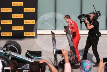 World © Octane Photographic Ltd. Formula 1 – Canadian GP. Parc Ferme. Scuderia Ferrari SF90 – Sebastian Vettel switches the first and second position boards. Circuit de Gilles Villeneuve, Montreal, Canada. Sunday 9th June 2019.