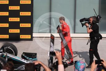 World © Octane Photographic Ltd. Formula 1 – Canadian GP. Parc Ferme. Scuderia Ferrari SF90 – Sebastian Vettel switches the first and second position boards. Circuit de Gilles Villeneuve, Montreal, Canada. Sunday 9th June 2019.