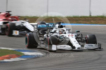 World © Octane Photographic Ltd. Formula 1 – German GP - Qualifying. Mercedes AMG Petronas Motorsport AMG F1 W10 EQ Power+ - Lewis Hamilton and Alfa Romeo Racing C38 – Kimi Raikkonen. Hockenheimring, Hockenheim, Germany. Saturday 27th July 2019.