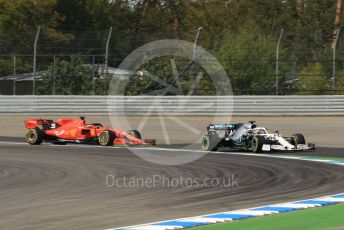 World © Octane Photographic Ltd. Formula 1 – German GP - Practice 2. Mercedes AMG Petronas Motorsport AMG F1 W10 EQ Power+ - Lewis Hamilton and Scuderia Ferrari SF90 – Sebastian Vettel. Hockenheimring, Hockenheim, Germany. Friday 26th July 2019.