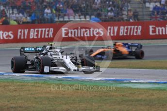 World © Octane Photographic Ltd. Formula 1 – German GP - Race. Mercedes AMG Petronas Motorsport AMG F1 W10 EQ Power+ - Valtteri Bottas and McLaren MCL34 – Carlos Sainz and Rich Energy Haas F1 Team VF19 – Kevin Magnussen. Hockenheimring, Hockenheim, Germany. Sunday 28th July 2019.