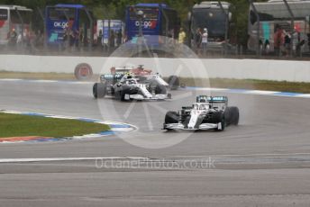 World © Octane Photographic Ltd. Formula 1 – German GP - Race. Mercedes AMG Petronas Motorsport AMG F1 W10 EQ Power+ - Lewis Hamilton and Valtteri Bottas with Alfa Romeo Racing C38 – Kimi Raikkonen. Hockenheimring, Hockenheim, Germany. Sunday 28th July 2019.