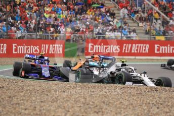 World © Octane Photographic Ltd. Formula 1 – German GP - Race. Mercedes AMG Petronas Motorsport AMG F1 W10 EQ Power+ - Valtteri Bottas, Scuderia Toro Rosso STR14 – Alexander Albon and McLaren MCL34 – Carlos Sainz. Hockenheimring, Hockenheim, Germany. Sunday 28th July 2019.