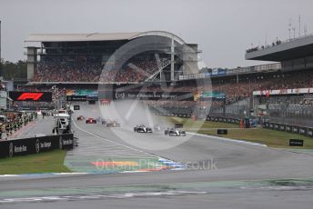 World © Octane Photographic Ltd. Formula 1 – German GP - Race. Mercedes AMG Petronas Motorsport AMG F1 W10 EQ Power+ - Lewis Hamilton and Valtteri Bottas lead the pack. Hockenheimring, Hockenheim, Germany. Sunday 28th July 2019.