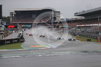 World © Octane Photographic Ltd. Formula 1 – German GP - Race. Mercedes AMG Petronas Motorsport AMG F1 W10 EQ Power+ - Lewis Hamilton and Valtteri Bottas lead the pack. Hockenheimring, Hockenheim, Germany. Sunday 28th July 2019.