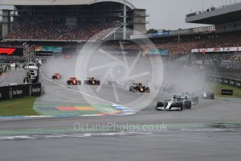 World © Octane Photographic Ltd. Formula 1 – German GP - Race. Mercedes AMG Petronas Motorsport AMG F1 W10 EQ Power+ - Lewis Hamilton and Valtteri Bottas lead the pack. Hockenheimring, Hockenheim, Germany. Sunday 28th July 2019.