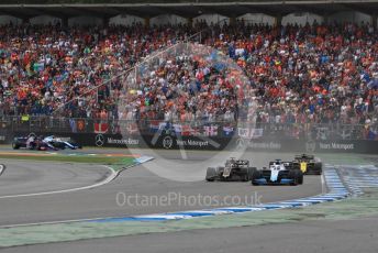 World © Octane Photographic Ltd. Formula 1 – German GP - Race. Rich Energy Haas F1 Team VF19 – Romain Grosjean and ROKiT Williams Racing FW 42 – George Russell with Renault Sport F1 Team RS19 – Daniel Ricciardo. Hockenheimring, Hockenheim, Germany. Sunday 28th July 2019.