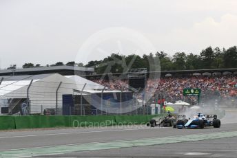 World © Octane Photographic Ltd. Formula 1 – German GP - Race. Rich Energy Haas F1 Team VF19 – Romain Grosjean and ROKiT Williams Racing FW 42 – George Russell. Hockenheimring, Hockenheim, Germany. Sunday 28th July 2019.