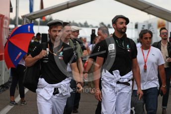 World © Octane Photographic Ltd. Formula 1 – German GP - Paddock. Mercedes AMG Petronas Motorsport AMG F1 mechanics in retro overalls. Hockenheimring, Hockenheim, Germany. Saturday 27th July 2019.