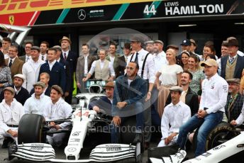 World © Octane Photographic Ltd. Formula 1 – German GP - Paddock. Mercedes AMG Petronas Motorsport AMG F1 W10 EQ Power+ - Lewis Hamilton and Valtteri Bottas.  with entire team in their 125th anniversary retro uniforms and outfits. Hockenheimring, Hockenheim, Germany. Sunday 28th July 2019.