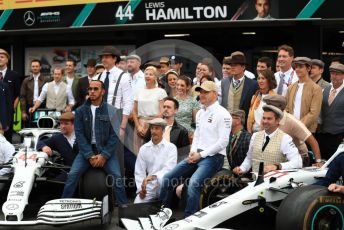 World © Octane Photographic Ltd. Formula 1 – German GP - Paddock. Mercedes AMG Petronas Motorsport AMG F1 W10 EQ Power+ - Lewis Hamilton and Valtteri Bottas. with entire team in their 125th anniversary retro uniforms and outfits. Hockenheimring, Hockenheim, Germany. Sunday 28th July 2019.