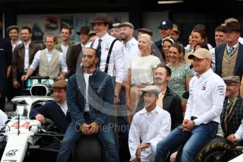 World © Octane Photographic Ltd. Formula 1 – German GP - Paddock. Mercedes AMG Petronas Motorsport AMG F1 W10 EQ Power+ - Lewis Hamilton and Valtteri Bottas. with entire team in their 125th anniversary retro uniforms and outfits. Hockenheimring, Hockenheim, Germany. Sunday 28th July 2019.