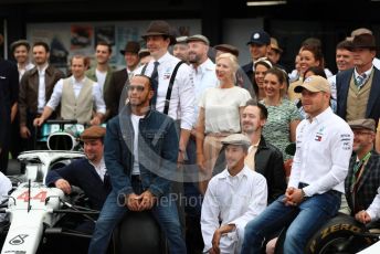 World © Octane Photographic Ltd. Formula 1 – German GP - Paddock. Mercedes AMG Petronas Motorsport AMG F1 W10 EQ Power+ - Lewis Hamilton and Valtteri Bottas.  with entire team in their 125th anniversary retro uniforms and outfits. Hockenheimring, Hockenheim, Germany. Sunday 28th July 2019.