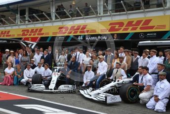 World © Octane Photographic Ltd. Formula 1 – German GP - Paddock. Mercedes AMG Petronas Motorsport AMG F1 W10 EQ Power+ - Lewis Hamilton and Valtteri Bottas. with entire team in their 125th anniversary retro uniforms and outfits. Hockenheimring, Hockenheim, Germany. Sunday 28th July 2019.