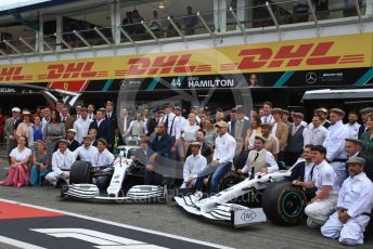 World © Octane Photographic Ltd. Formula 1 – German GP - Paddock. Mercedes AMG Petronas Motorsport AMG F1 W10 EQ Power+ - Lewis Hamilton and Valtteri Bottas.  with entire team in their 125th anniversary retro uniforms and outfits. Hockenheimring, Hockenheim, Germany. Sunday 28th July 2019.