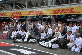 World © Octane Photographic Ltd. Formula 1 – German GP - Paddock. Mercedes AMG Petronas Motorsport AMG F1 W10 EQ Power+ - Lewis Hamilton and Valtteri Bottas. with entire team in their 125th anniversary retro uniforms and outfits. Hockenheimring, Hockenheim, Germany. Sunday 28th July 2019.