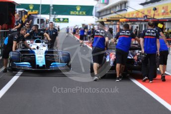 World © Octane Photographic Ltd. Formula 1 – Hungarian GP - Pitlane. ROKiT Williams Racing FW 42 – George Russell and Scuderia Toro Rosso STR14. Hungaroring, Budapest, Hungary. Thursday 1st August 2019.