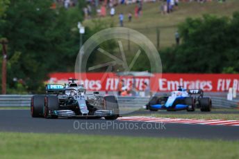 World © Octane Photographic Ltd. Formula 1 – Hungarian GP - Practice 1. Mercedes AMG Petronas Motorsport AMG F1 W10 EQ Power+ - Lewis Hamilton and ROKiT Williams Racing FW 42 – George Russell. Hungaroring, Budapest, Hungary. Friday 2nd August 2019.