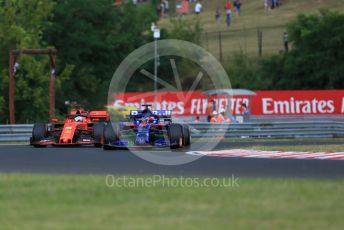 World © Octane Photographic Ltd. Formula 1 – Hungarian GP - Practice 1. Scuderia Toro Rosso STR14 – Daniil Kvyat and Scuderia Ferrari SF90 – Sebastian Vettel. Hungaroring, Budapest, Hungary. Friday 2nd August 2019.