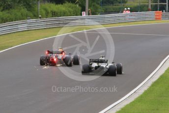 World © Octane Photographic Ltd. Formula 1 – Hungarian GP - Practice 2. Aston Martin Red Bull Racing RB15 – Pierre Gasly and Renault Sport F1 Team RS19 – Daniel Ricciardo. Hungaroring, Budapest, Hungary. Friday 2nd August 2019.