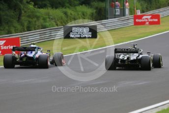 World © Octane Photographic Ltd. Formula 1 – Hungarian GP - Practice 2. Scuderia Toro Rosso STR14 – Alexander Albon and Rich Energy Haas F1 Team VF19 – Romain Grosjean. Hungaroring, Budapest, Hungary. Friday 2nd August 2019.