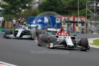 World © Octane Photographic Ltd. Formula 1 – Hungarian GP - Practice 2. Alfa Romeo Racing C38 – Kimi Raikkonen and Mercedes AMG Petronas Motorsport AMG F1 W10 EQ Power+ - Valtteri Bottas. Hungaroring, Budapest, Hungary. Friday 2nd August 2019.