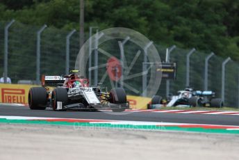 World © Octane Photographic Ltd. Formula 1 – Hungarian GP - Practice 2. Alfa Romeo Racing C38 – Antonio Giovinazzi and Mercedes AMG Petronas Motorsport AMG F1 W10 EQ Power+ - Lewis Hamilton. Hungaroring, Budapest, Hungary. Friday 2nd August 2019.