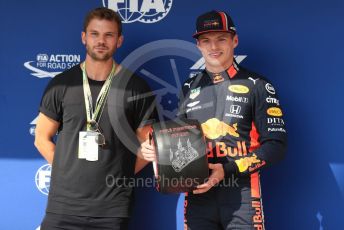 World © Octane Photographic Ltd. Formula 1 – Hungarian GP - Qualifying. Aston Martin Red Bull Racing RB15 – Max Verstappen receives the Pirelli Pole Position Award from the Pirelli Representative, actor Jeremy Irvine. Hungaroring, Budapest, Hungary. Saturday 3rd August 2019.