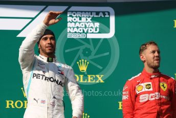 World © Octane Photographic Ltd. Formula 1 – Hungarian GP - Podium. Mercedes AMG Petronas Motorsport AMG F1 W10 EQ Power+ - Lewis Hamilton and Scuderia Ferrari SF90 – Sebastian Vettel. Hungaroring, Budapest, Hungary. Sunday 4th August 2019.