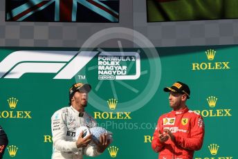 World © Octane Photographic Ltd. Formula 1 – Hungarian GP - Podium. Mercedes AMG Petronas Motorsport AMG F1 W10 EQ Power+ - Lewis Hamilton and Scuderia Ferrari SF90 – Sebastian Vettel. Hungaroring, Budapest, Hungary. Sunday 4th August 2019.