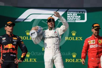 World © Octane Photographic Ltd. Formula 1 – Hungarian GP - Podium. Mercedes AMG Petronas Motorsport AMG F1 W10 EQ Power+ - Lewis Hamilton, Aston Martin Red Bull Racing RB15 – Max Verstappen and Scuderia Ferrari SF90 – Sebastian Vettel. Hungaroring, Budapest, Hungary. Sunday 4th August 2019.