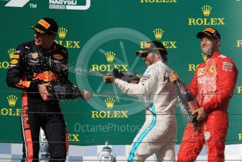 World © Octane Photographic Ltd. Formula 1 – Hungarian GP - Podium. Mercedes AMG Petronas Motorsport AMG F1 W10 EQ Power+ - Lewis Hamilton, Aston Martin Red Bull Racing RB15 – Max Verstappen and Scuderia Ferrari SF90 – Sebastian Vettel. Hungaroring, Budapest, Hungary. Sunday 4th August 2019.