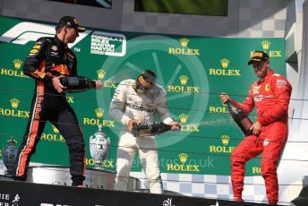 World © Octane Photographic Ltd. Formula 1 – Hungarian GP - Podium. Mercedes AMG Petronas Motorsport AMG F1 W10 EQ Power+ - Lewis Hamilton, Aston Martin Red Bull Racing RB15 – Max Verstappen and Scuderia Ferrari SF90 – Sebastian Vettel. Hungaroring, Budapest, Hungary. Sunday 4th August 2019.