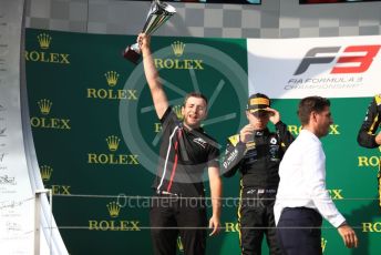 World © Octane Photographic Ltd. FIA Formula 3 (F3) – Hungarian GP – Race 1. ART Grand Prix mechanic receiving the constructor's trophy and Max Fewtrell and HWA Racelab - Jake Hughes. Hungaroring, Budapest, Hungary. Saturday 3rd August 2019.
