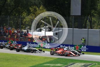 World © Octane Photographic Ltd. Formula 1 – Italian GP - Race. Scuderia Ferrari SF90 – Charles Leclerc and Mercedes AMG Petronas Motorsport AMG F1 W10 EQ Power+ - Valtteri Bottas leads into turn 1. Autodromo Nazionale Monza, Monza, Italy. Sunday 8th September 2019.
