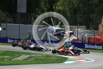 World © Octane Photographic Ltd. Formula 1 – Italian GP - Race. Scuderia Ferrari SF90 – Charles Leclerc and Mercedes AMG Petronas Motorsport AMG F1 W10 EQ Power+ - Valtteri Bottas leads into turn 1. Autodromo Nazionale Monza, Monza, Italy. Sunday 8th September 2019.