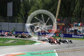 World © Octane Photographic Ltd. Formula 1 – Italian GP - Race. Scuderia Ferrari SF90 – Charles Leclerc and Mercedes AMG Petronas Motorsport AMG F1 W10 EQ Power+ - Valtteri Bottas leads into turn 1. Autodromo Nazionale Monza, Monza, Italy. Sunday 8th September 2019.