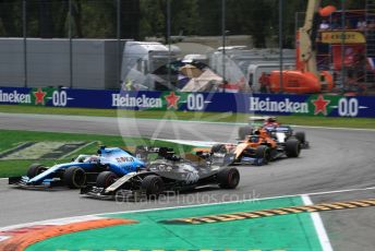 World © Octane Photographic Ltd. Formula 1 – Italian GP - Race. Rich Energy Haas F1 Team VF19 – Romain Grosjean and ROKiT Williams Racing FW 42 – George Russell. Autodromo. Autodromo Nazionale Monza, Monza, Italy. Sunday 8th September 2019.