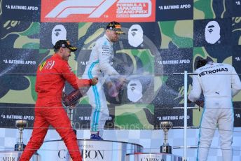 World © Octane Photographic Ltd. Formula 1 – Japanese GP - Podium. Mercedes AMG Petronas Motorsport AMG F1 W10 EQ Power+ - Valtteri Bottas and Lewis Hamilton, Scuderia Ferrari SF90 – Sebastian Vettel. Suzuka Circuit, Suzuka, Japan. Sunday 13th October 2019.